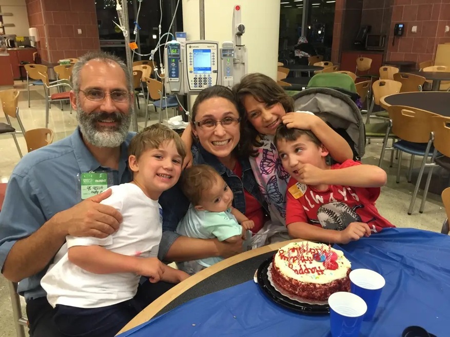 Family celebrating a birthday at CHLA hospital in Hollywood.