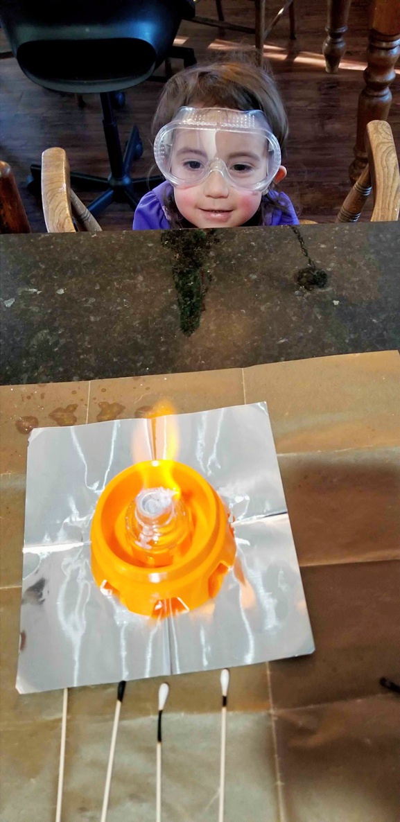 My youngest in wonder at the fire volcano experiment!